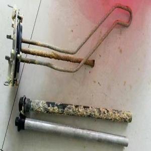 What is the function of the magnesium rod anode of the water heater?